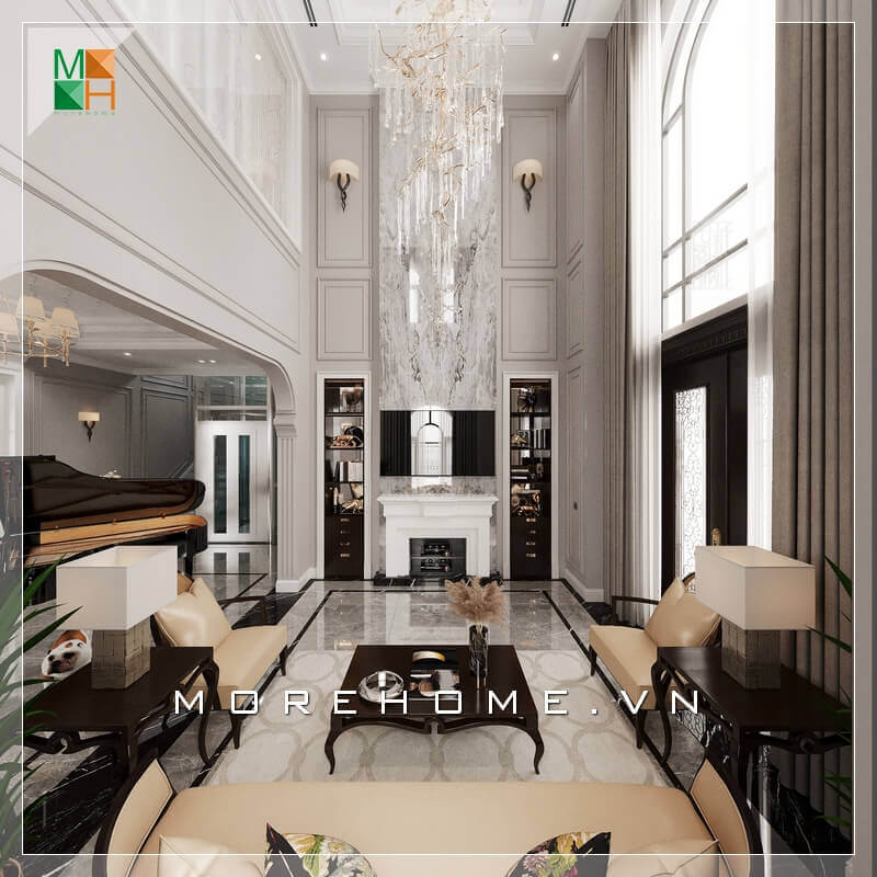 Không gian phòng khách tráng lệ, với mẫu bàn ghế sofa phòng khách sử dụng chất liệu bàn là gỗ tự nhiên cao cấp, ghế sofa bọc da chân ghế sang trọng. Tất cả tạo nên một không gian phòng khách rất hoành tráng và đẳng cấp. Thiết kế phòng khách biệt thự