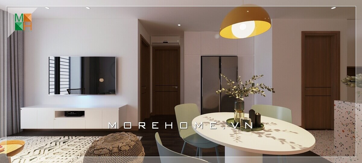 Mẫu thiết kế nội thất đơn giản phòng khách liền kề bếp ăn cho chung cư diện tích nhỏ theo phong cách hiện đại. Mẫu bàn ghế ăn hiện đại, bàn ăn hình tròn và màu trắng rất đẹp mắt.