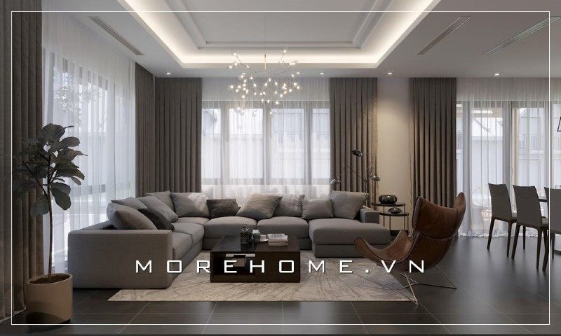 Bộ ghế sofa màu xám mang tới sự hiện đại, sang chảnh cho không gian của căn phòng.